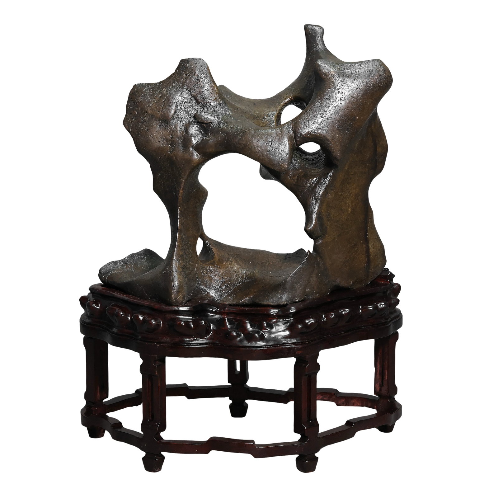Qing Dynasty Natural Horizontal Circular Hollow Taihu Scholar’s Display Stone: Dimensions: Overall Height 55cm (21.65in), Maximum Horizontal Width 74cm (29.13in), Qing DynastyCondition & Provenance: Category: Chinese Scholar’s Rocks & Miscellaneous Art, primary trading markets
