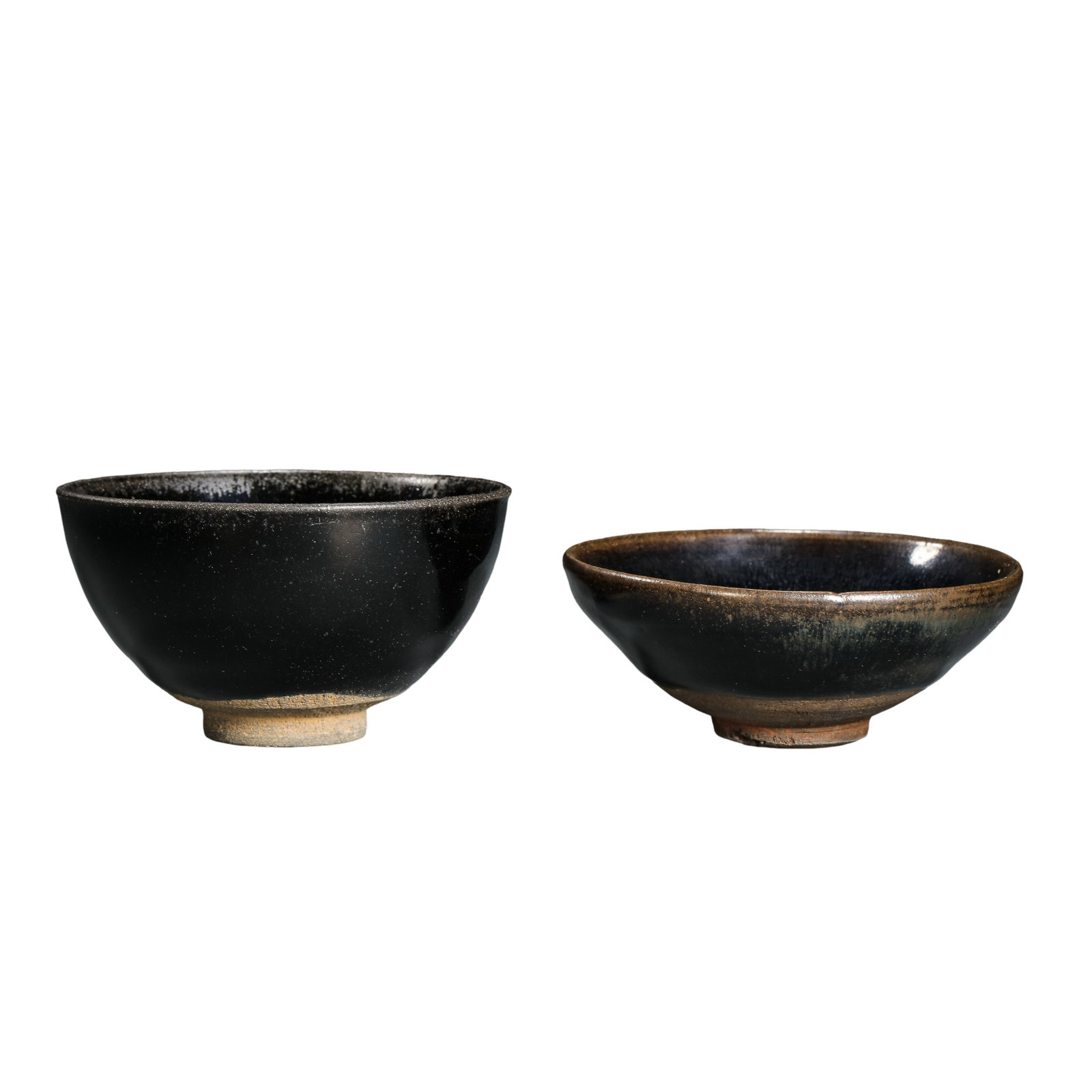 Song Dynasty Jian Kiln Solid Black Glaze Beveled Tea Bowl,12th-13th Century: Measurements:Rim Diameter:9.8 centimeters /3.86 inches,Height:5.5 centimeters /2.17 inches,Manufactured 12th–13th CenturyCondition & Provenance:The bowl is fully intact with no cracks,chips or resto