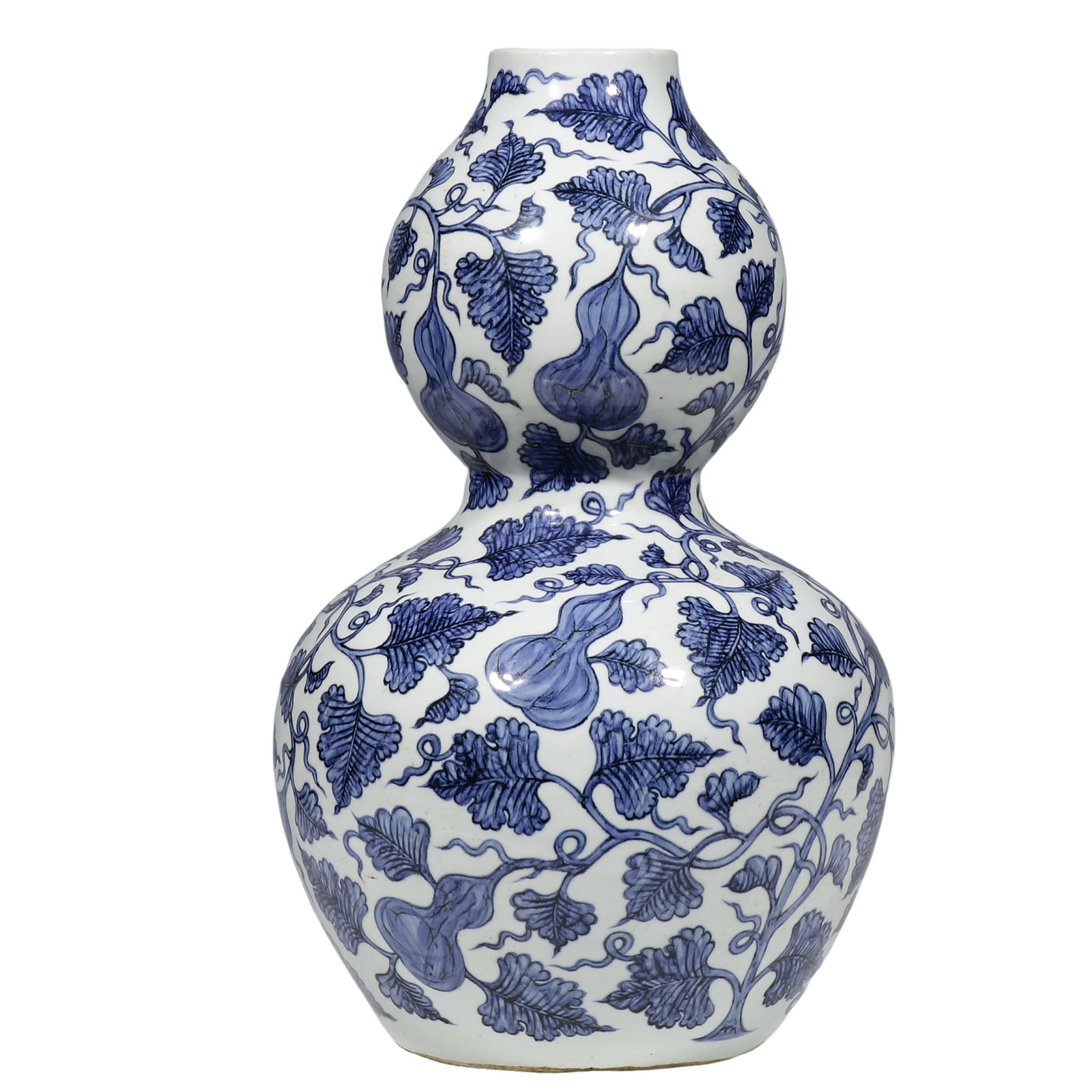 Dynasty Blue-and-White Double-Gourd Vase with Continuous Gourd Vines: Dimensions 46 cm (approximately 18.11 in); Yuan Dynasty, 13th–14th centuryCondition and Provenance in well-preserved condition, retaining the complete double-gourd profile, narrow waist, mouth, and 