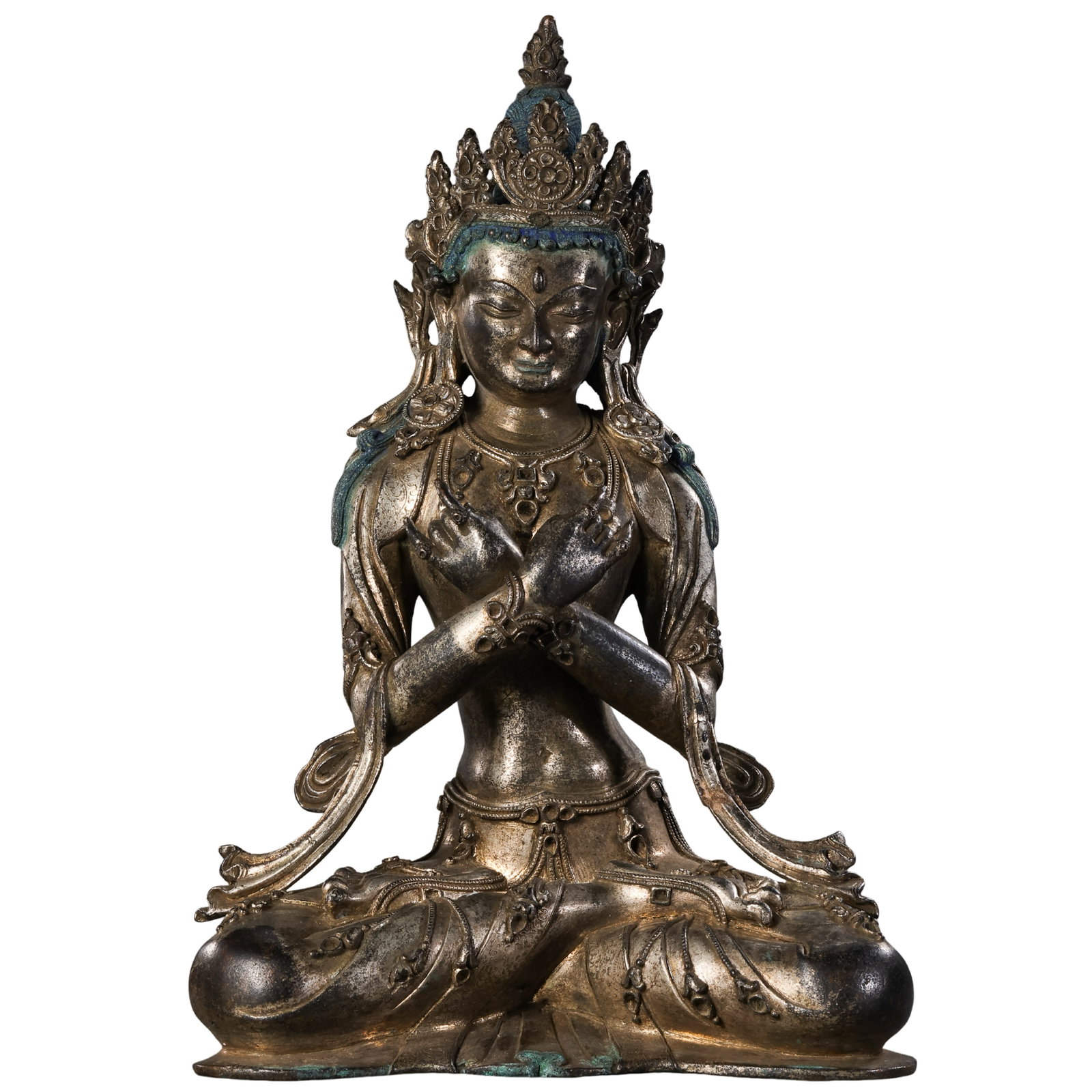 18th Century,Tibetan Copper?Silver Alloy Seated Vajradhara: Dimension?H 25.5cm(10.04in),W 17.5cm(6.89in),Weight 2.87kg,18th Century Condition & Provenance?The figure is fully intact without breaks or losses.The silvered surface displays natural aged mottling o