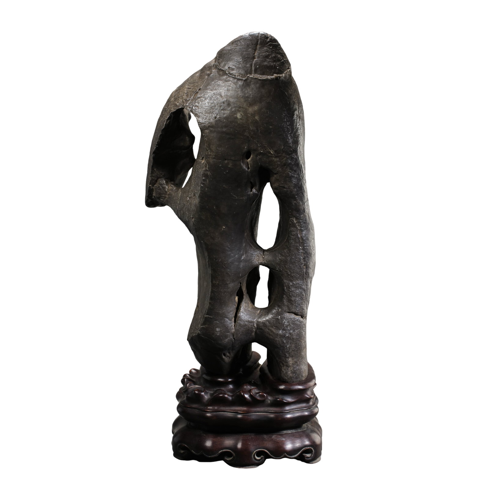 Large Black Taihu Scholar’s Rock,Qing Dynasty,17th?19th Century: Dimensions:Overall height with original stand 67 cm (26.38 in),rock height 55 cm (21.65 in),Qing Dynasty,17th?19th CenturyCondition & Provenance:The Taihu rock is natural stone without major breakage 
