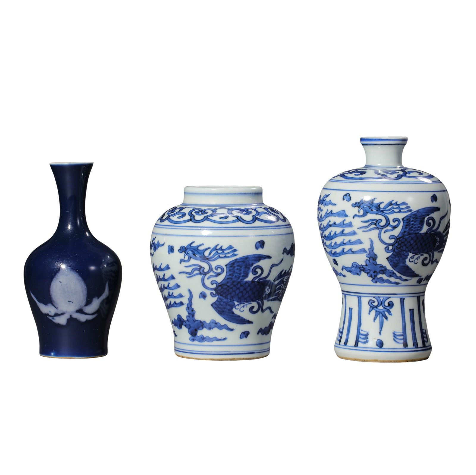 Group of Three Porcelains:Blue?Glazed Vase with Reserve?Peach Decoration,Blue?and?White: Dimensions:Blue?glazed peach?motif vase height 14 cm (5.51 in);blue?and?white phoenix jar height 14 cm (5.51 in);blue?and?white phoenix meiping height 16 cm (6.30 in),Qing Dynasty,18th?19th CenturyCon