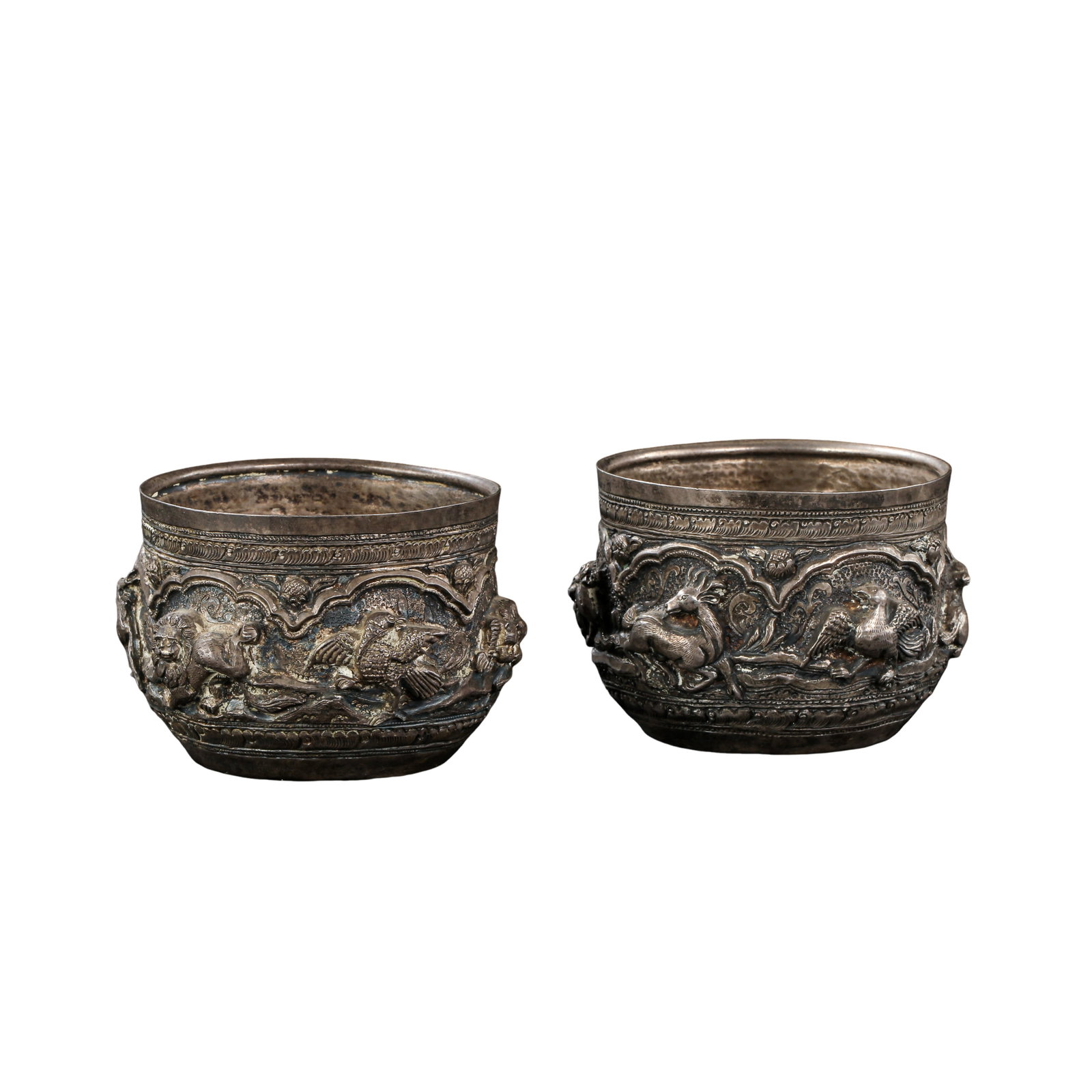 A Pair of Repoussé Silver Cups with Animal?Bird Motifs, Qing Dynasty (1 of 10)