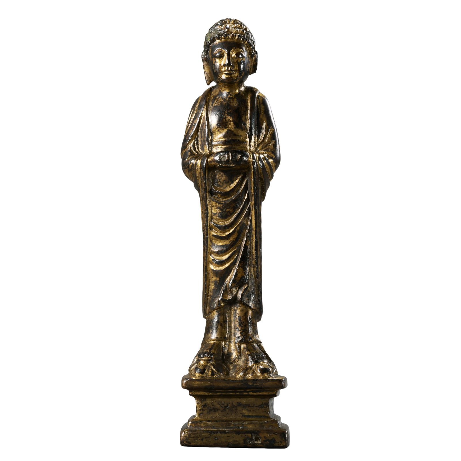Liao?Jin Gilt?Bronze Standing Shakyamuni Buddha: Overall Height 10cm (3 15/16 in), 10?13th Century Base Width 2.8cm (1 1/8 in) Condition & Provenance: The sculpture remains intact throughout, with naturally faded gilding, heavy inherited antique pat