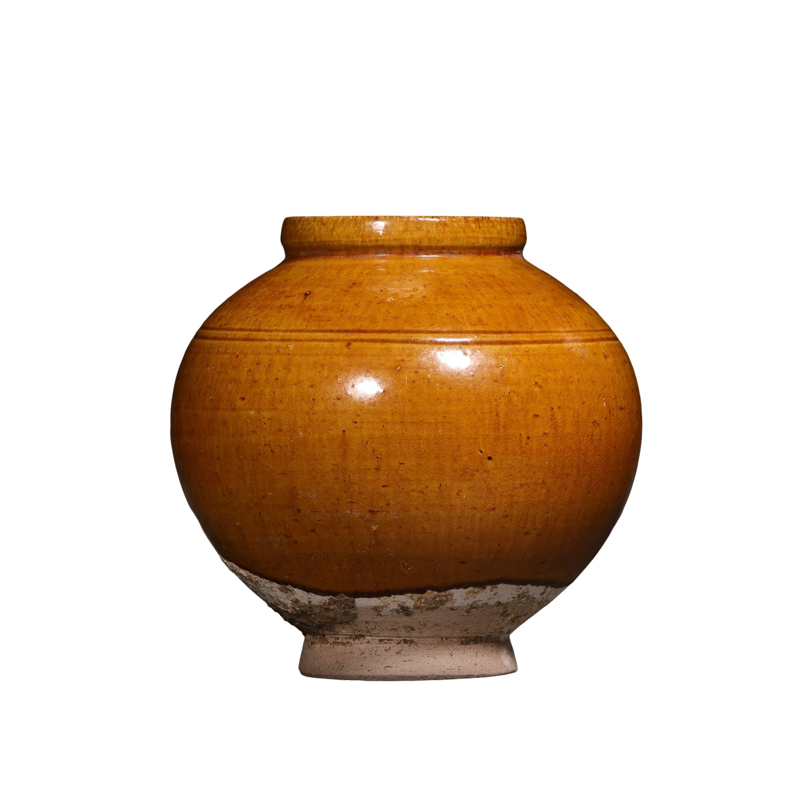 Chinese Tang Dynasty Amber?Yellow Glazed Jar: Dimensions:Height 12.5 cm (4?15/16 in),Mouth Diameter 6.5 cm (2?9/16 in)Condition & Provenance:The glaze shows rich uneven color shifts across the entire surface with lighter golden?yellow patches ble