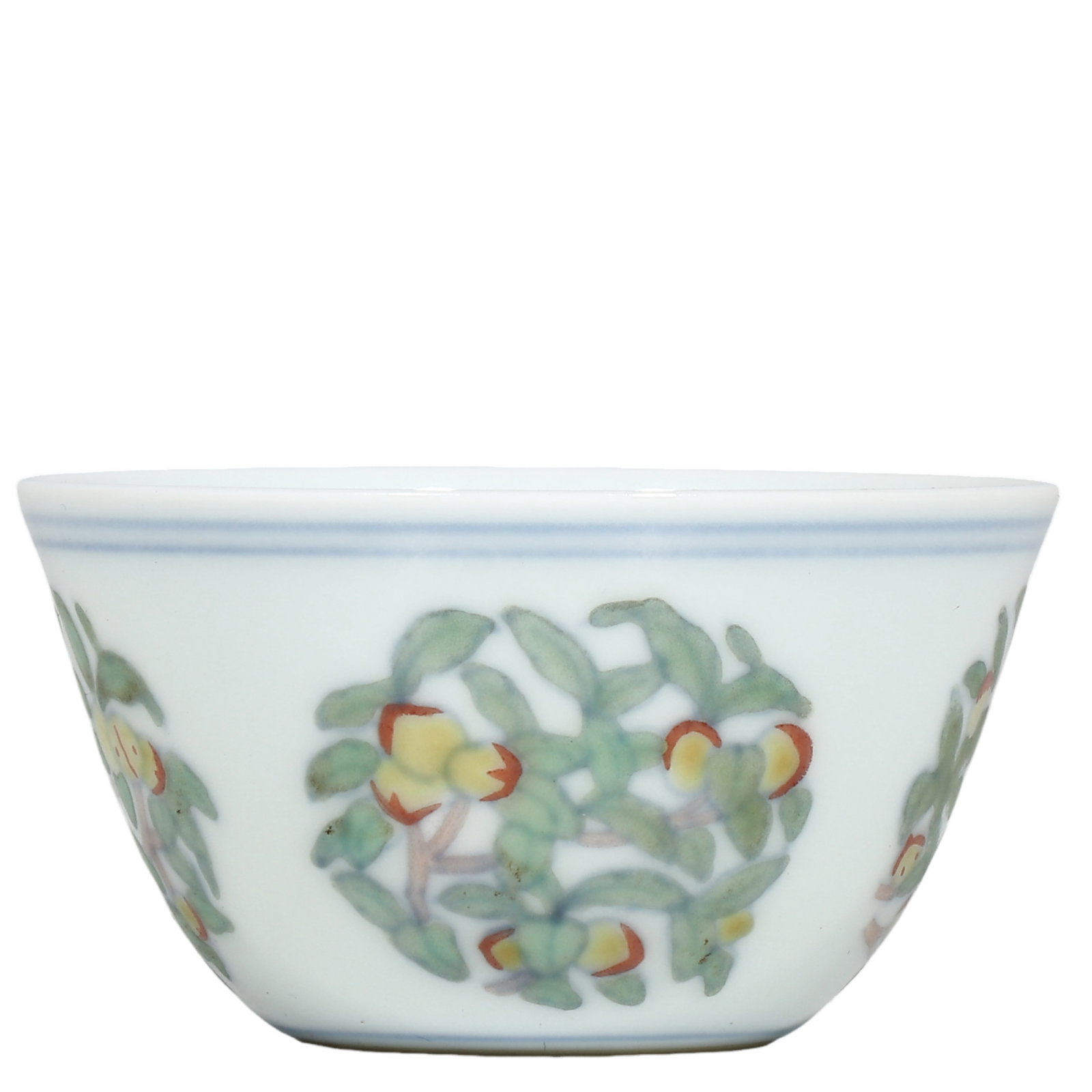 Ming Chenghua Period Doucai Cup With Medallion Fruit?Spray Motif: Dimensions?H.4cm?Diam.6.6cm Condition & Provenance?Fully intact, no cracks or chips. Well?preserved doucai enamels with natural aged glaze patina. Old soil patina on unglazed foot?ring. No modern rest