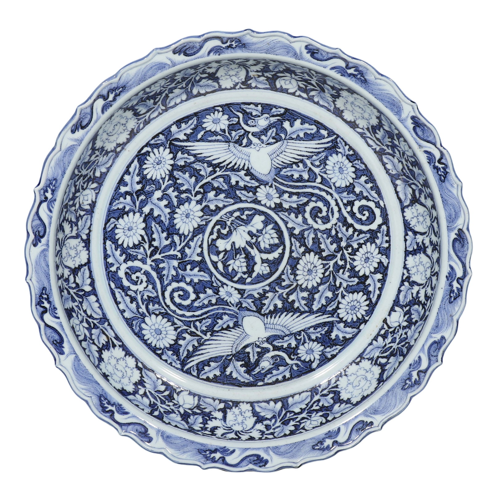 Yuan?Dynasty Blue?Ground?Reserve?White Large?Lobed Charger with: Dimensions: Diam. 44?cm, Yuan dynasty, 14th?century Condition & Provenance: Condition: Mainly intact, negligible age?related rim wear, no cracks, chips or modern restoration. Lobed foliated folded?rim