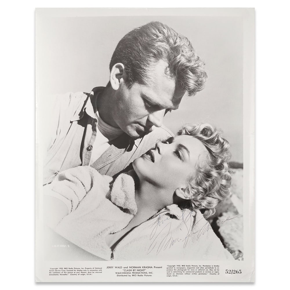 MARILYN MONROE SIGNED "CLASH BY NIGHT" 1952 PUBLICITY PHOTO: 10 x 8 in (25.5 x 20.2 cm) Provenance and Authentication: According to the Letter of Authenticity (LOA) and Certificate of Authenticity (COA) provided by the consignor, this collectible was subjected