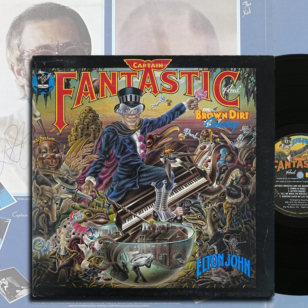 ELTON JOHN & BERNIE TAUPIN FULLY SIGNED "CAPTAIN FANTASTIC AND THE BROWN DIRT COWBOY" LP: 12 1/4 x 12 1/4 in Provenance and Authentication: According to the accompanying documentation provided by the consignor, the signatures have been examined with reference to multiple factors, including