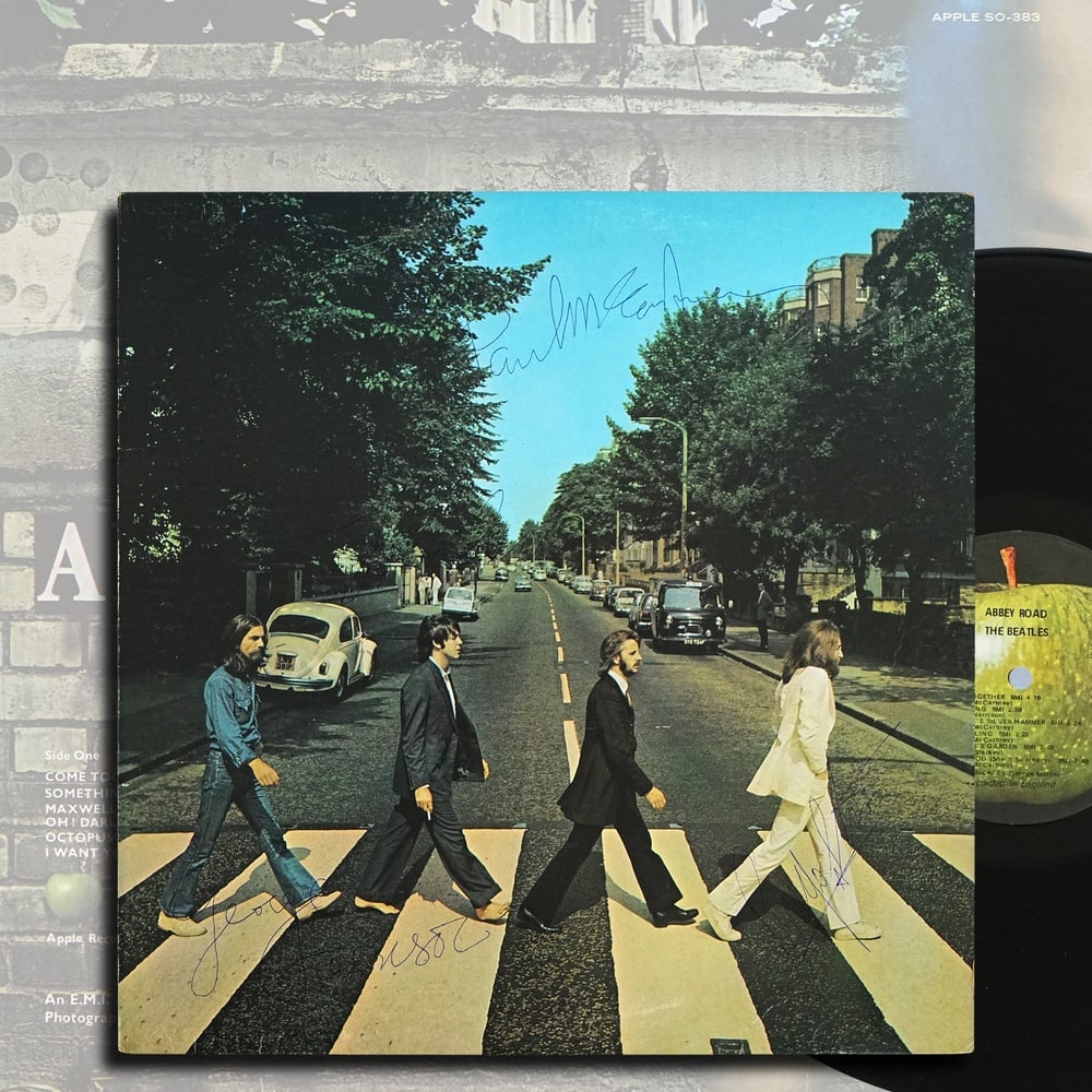 THE BEATLES FULLY SIGNED "ABBEY ROAD" 1969 U.S. FIRST PRESSING LP: 12 1/4 x 12 1/4 in Provenance and Authentication: According to the accompanying documentation provided by the consignor, the signatures have been examined with reference to multiple factors, including