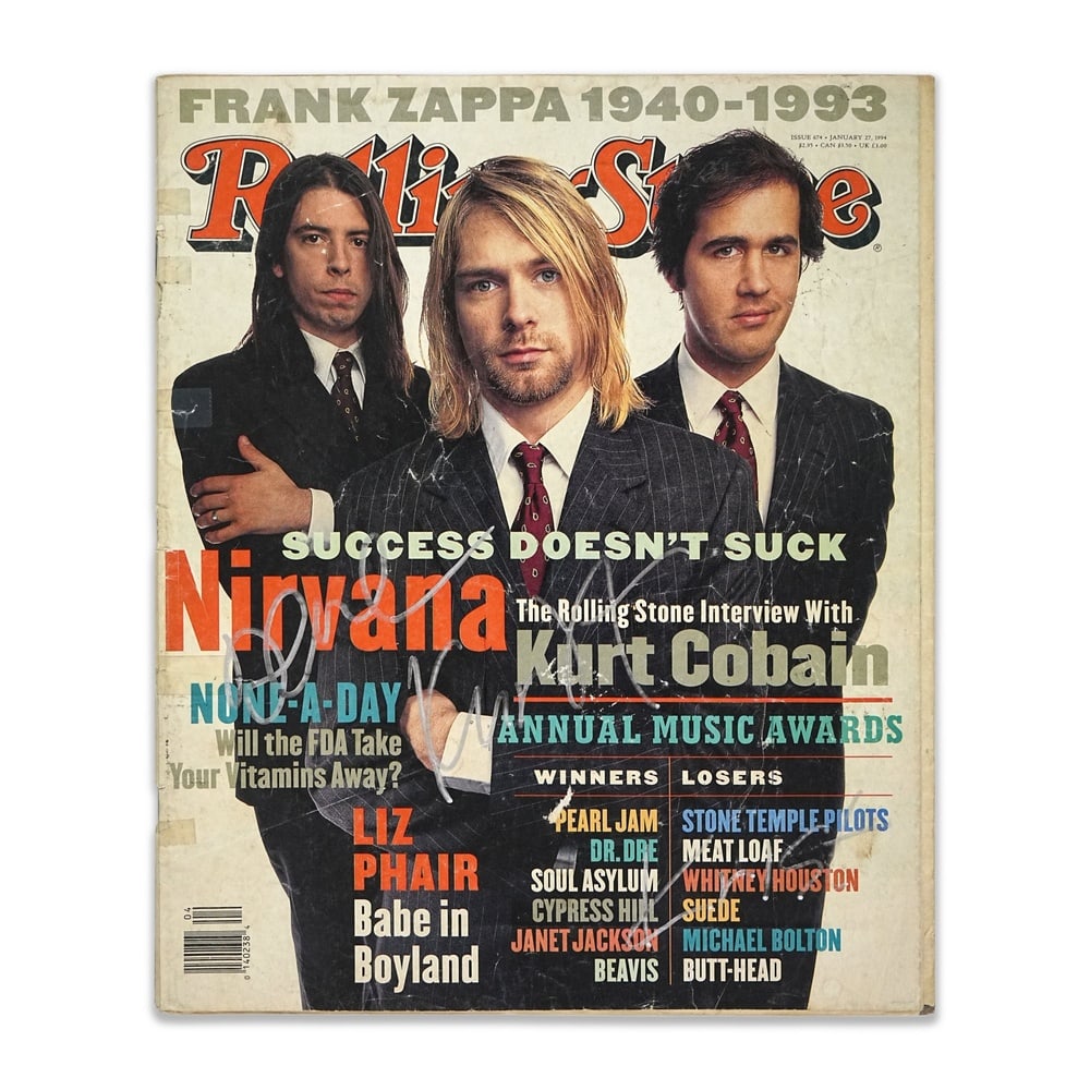 NIRVANA FULLY SIGNED "ROLLING STONE" MAGAZINE - KURT COBAIN COVER: 12 x 10 in (30.5 x 25.3 cm) Provenance and Authentication: According to the accompanying documentation provided by the consignor, the signatures have been examined with reference to multiple factors,