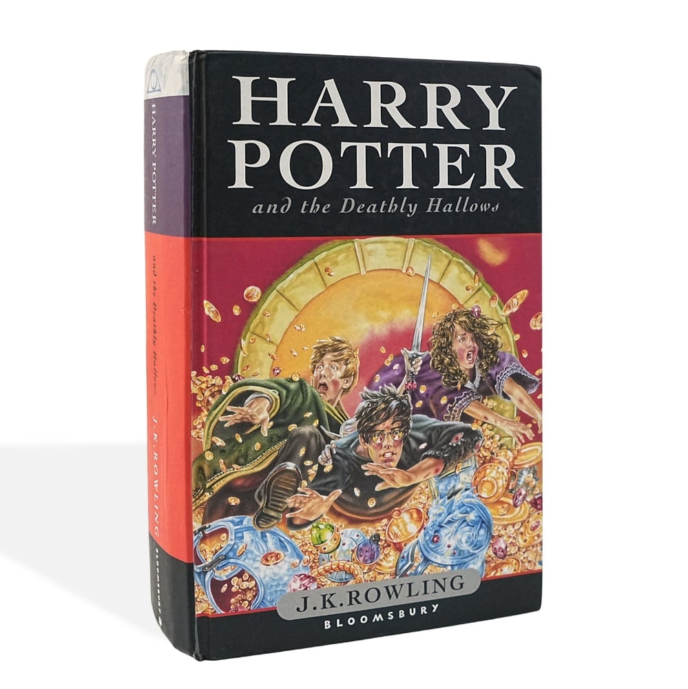 J.K. ROWLING SIGNED "HARRY POTTER AND THE DEATHLY HALLOWS," UK FIRST EDITION: 8 1/8 x 5 3/8 in (20.5 x 13.5 cm) A signed copy of Harry Potter and the Deathly Hallows by J.K. Rowling, published by Bloomsbury in Great Britain in 2007. The copyright page states "First published