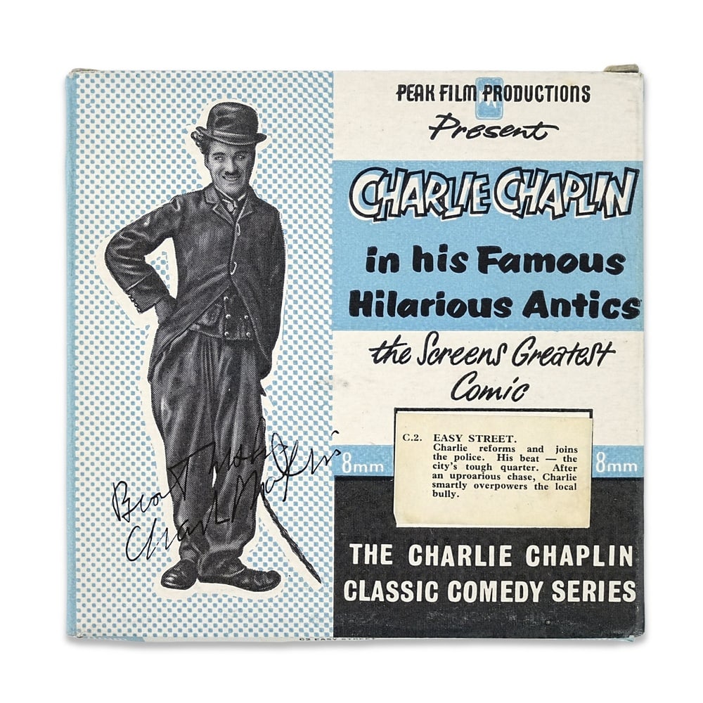 CHARLIE CHAPLIN SIGNED "EASY STREET" 8MM FILM BOX: Film Format: 8 mm Provenance and Authentication: According to the Letter of Authenticity (LOA) and Certificate of Authenticity (COA) provided by the consignor, this collectible was subjected to a