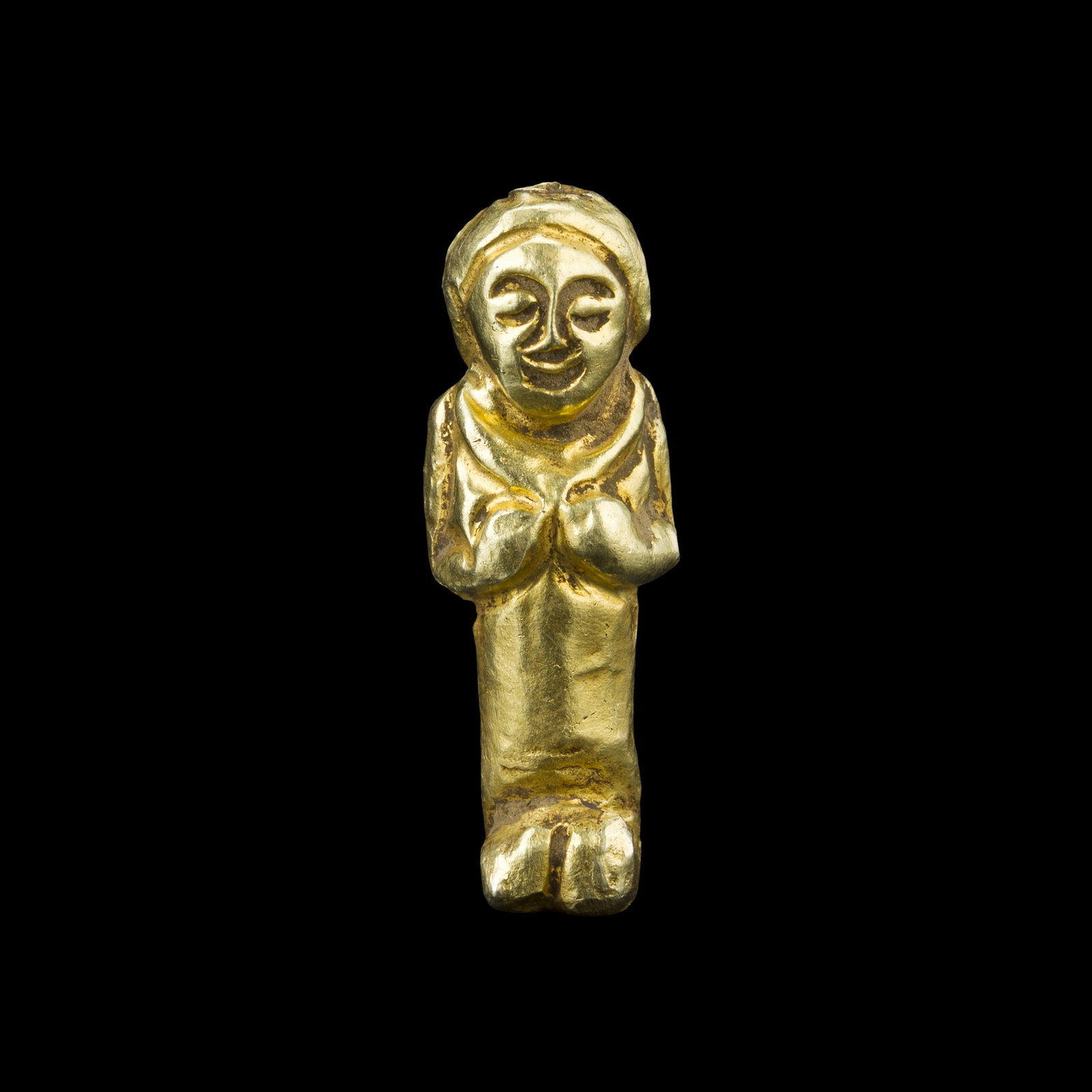 Southeast Asian Regions Gold Standing Figurine Hands in Prayer Pose: H. 2.8 cm. W. 1.4 cm. Weight 2.3 gram.