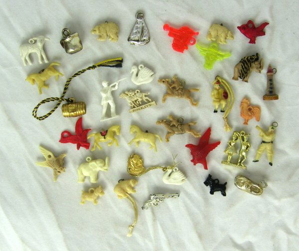 Lot of Vintage Bubble Gum Machine Charms: Lot of 38 Misc Bubble Gum Machine Toy Charms with Baseball Player & Catcher; Sizes Vary; Very Good