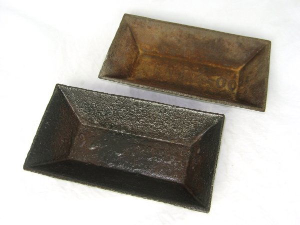2 Bentz Brunerville Cast Iron Hog Troughs: 193. 2 Frank Bentz Brunerville Foundry Miniature Cast Iron Hog Troughs - Embossed; 1 1/2" t.; Good - Minor Age Wear