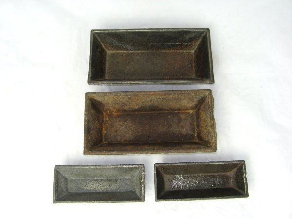 4 New Holland Foundry Sales Cast Iron Samples: 194. 4 New Holland Foundry Salesman Sample Cast Iron Hog Troughs; 1" t. - 1 1/2" t.; Very Good - Good - Minor Age Wear