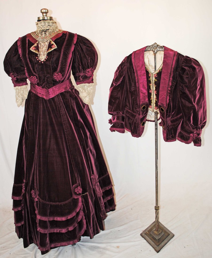 VICTORIAN VELVET VISITING DRESS, 1895 PARIS LABEL, ERNEST RAUDNITZ: VICTORIAN VELVET VISITING DRESS, 1895 PARIS LABEL, ERNEST RAUDNITZ A 1895 wine burgandy colored 2 piece outfit with matching jacket. With high schiffli lace neck, metallic trim and fancy pink fabric c