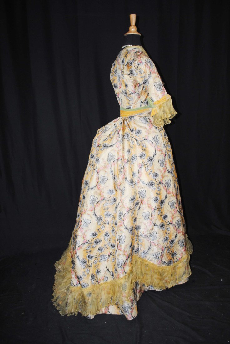 VICTORIAN 2 PIECE PATTERNED BROCADE SILK TAFFETA VISITING DRESS 1890, MUSEUM DEACCESSION: VICTORIAN 2 PIECE PATTERNED BROCADE SILK TAFFETA VISITING DRESS 1890, MUSEUM DEACCESSION A 1890s stunning patterned brocade silk taffeta and light green velvet outfit, 2 piece in construction dress. T