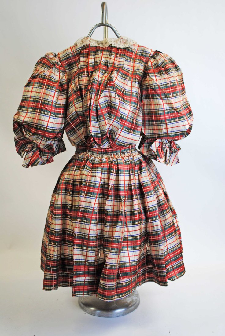 VICTORIAN CHILD'S SILK PLAID DRESS, 1890s: VICTORIAN CHILD'S SILK PLAID DRESS, 1890s A simply adorable original Victorian silk multi colored plaid child dress with puffed sleeves, ruching at waist line, and adorned with bows at back waist line
