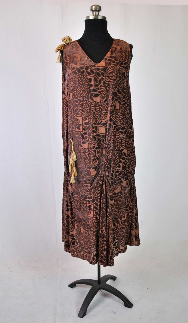 DEVORE VELVET FLAPPER PARTY DRESS, c1928: DEVORE VELVET FLAPPER PARTY DRESS, c1928 Lovely brown devore velvet 1928 flapper party dress This dress has a V neckline and fun fabric tassels attached to shoulder front and hip area. Shift style, dr