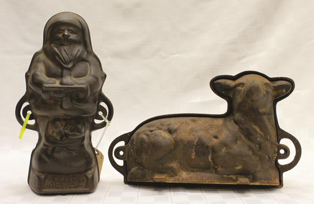Set of Two Loaf Molds: Iron Santa 11" H x 7" W Lamb 7": Lamb 7" H x 13" W Condition: Good