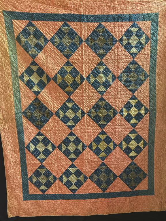 A Blue and Pink Pieced Quilt featuring 20 Blue Squares (1 of 1)