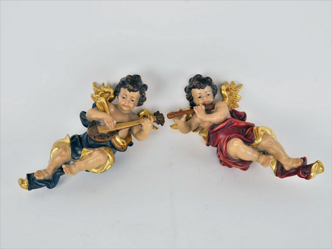 Pair of hovering, music-making putti (1 of 2)