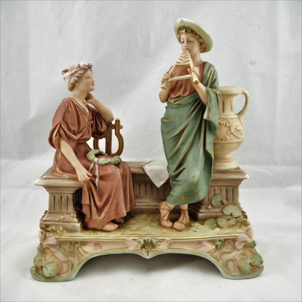 Women musicians, around 1920: Women musicians, around 1920made of porcelain, finely shaped, white and colored glazed, partly matt. In the background large amphora on a pedestal, stand decorated with art nouveau motifs. On the bott