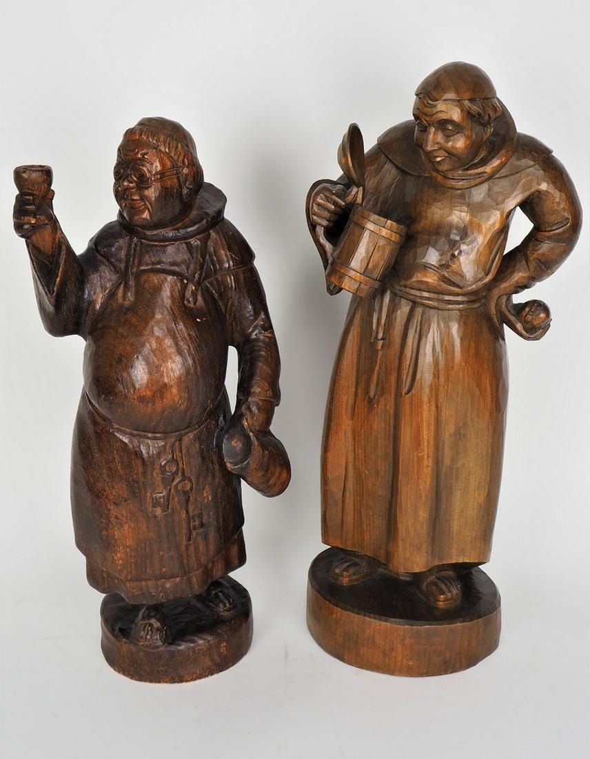 Two monks in funny pose: Two monks in funny poseMade of wood, probably linden, expertly carved, stained walnut color. One with beer mug in hands, the other with wine glass and wine jug. Both on round stand. Probably Val Garde