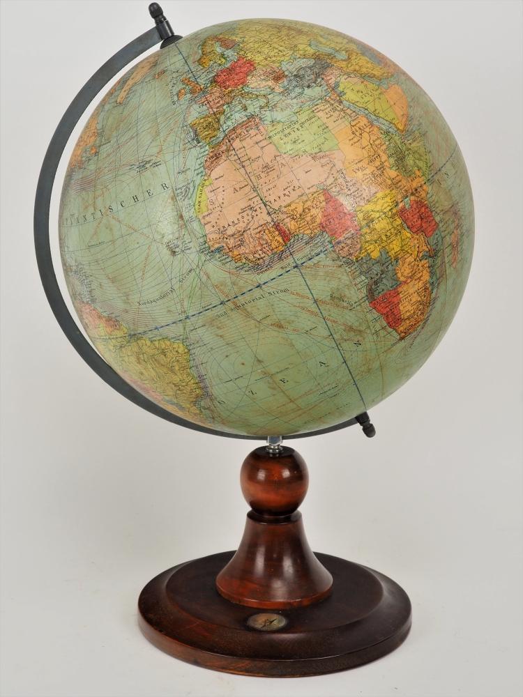 Large globe by "Dietrich Reimer", Berlin 1941: Large globe by "Dietrich Reimer", Berlin 1941Wide profiled wooden stand, walnut color, with integrated compass. Metal globe holder, rotating globe ball. Manufacturer's name "Dietrich Reimer und Andrew