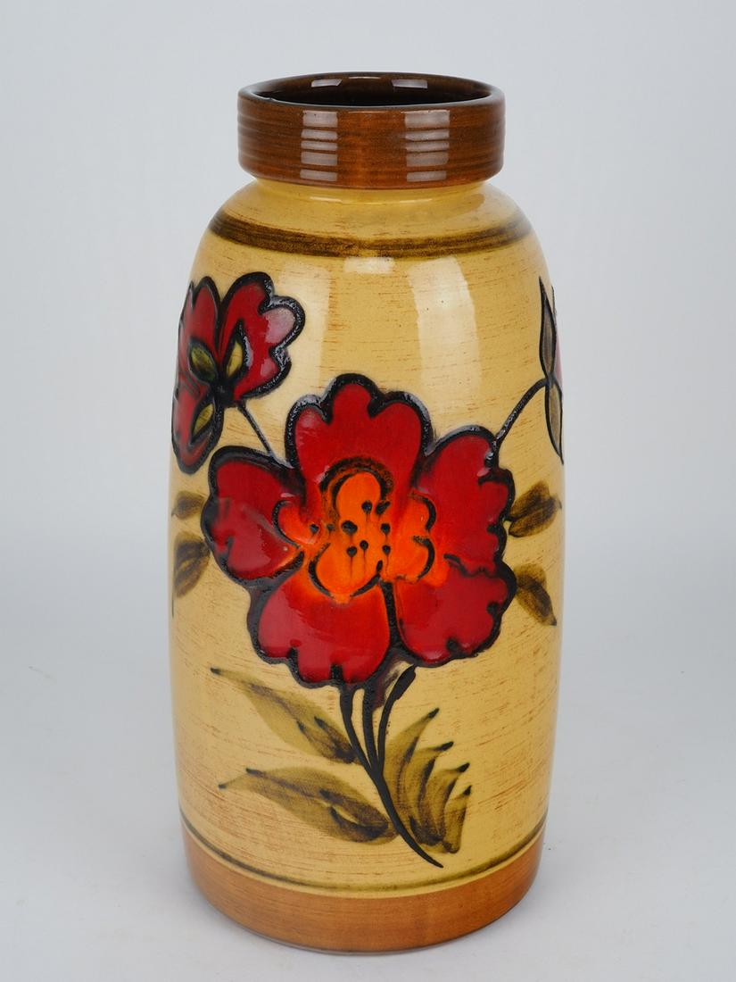 Large flower vase 70s: Large flower vase 70smade of ceramic. With wide base, tapering to the top. Vase mouth with grooved decoration. Painted with large red flowers, light relief, light and dark brown glaze. Intact. Probabl