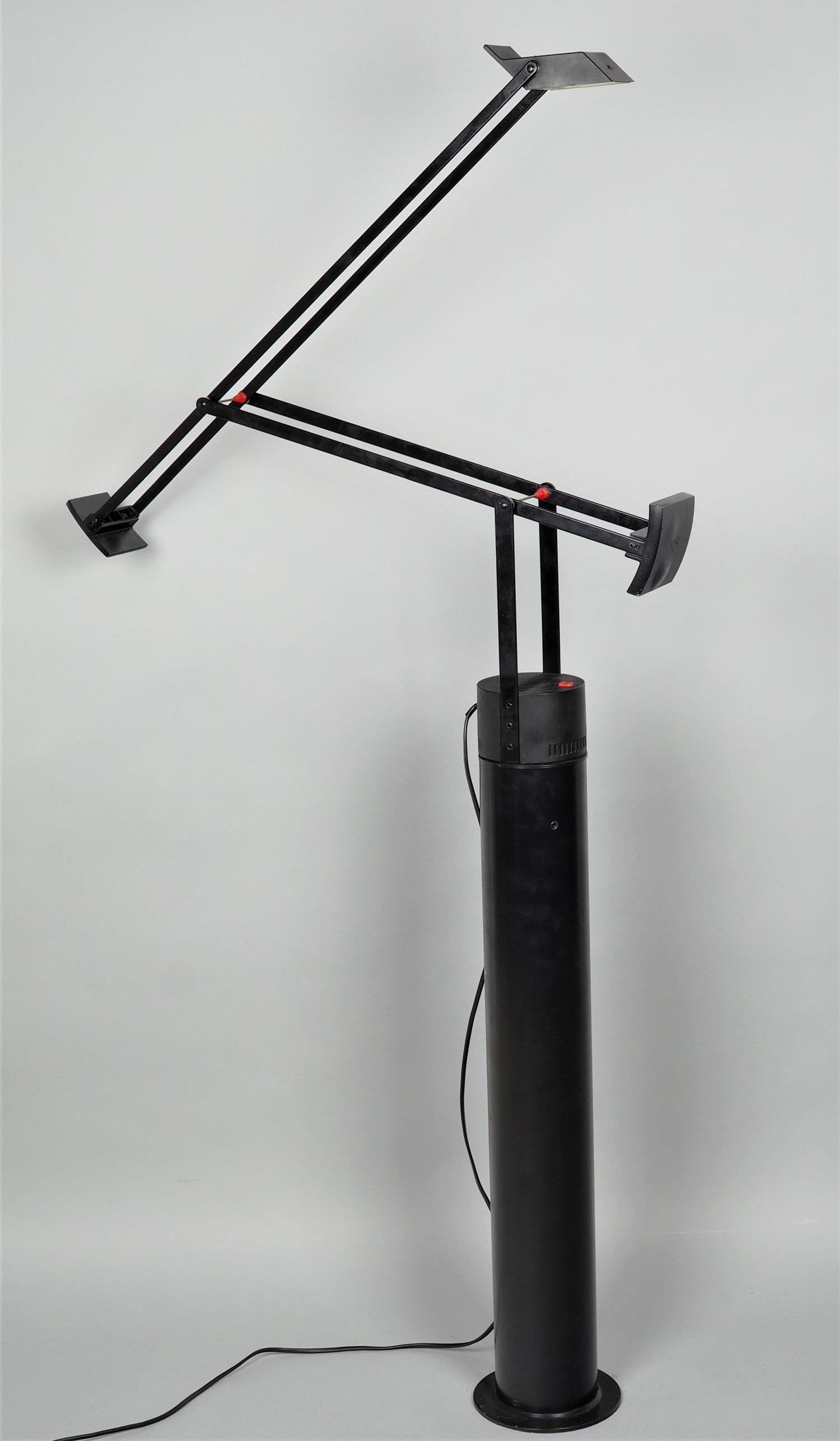 Tizio floor lamp, design Richard Sapper for Artemide, Italy, 1972.: Tizio floor lamp, design Richard Sapper for Artemide, Italy, 1972.Designer floor lamp "TIZIO TERRA 50", made of metal, two-piece, painted black. Tall, cylindrical metal stand on which sits a swivel ar