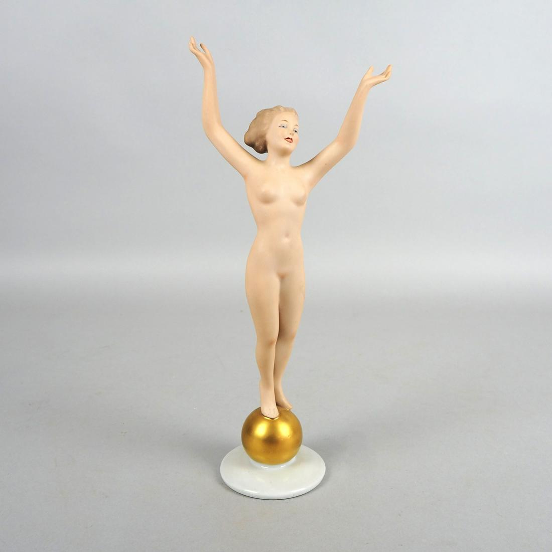 Wallendorf porcelain factory, dancer on gold ball, 2nd half of 20th century.: Wallendorf porcelain factory, dancer on gold ball, 2nd half of 20th century.White porcelain and bisque porcelain, partly naturalistic polychrome hand-painted and with gold decoration. Full figure of a