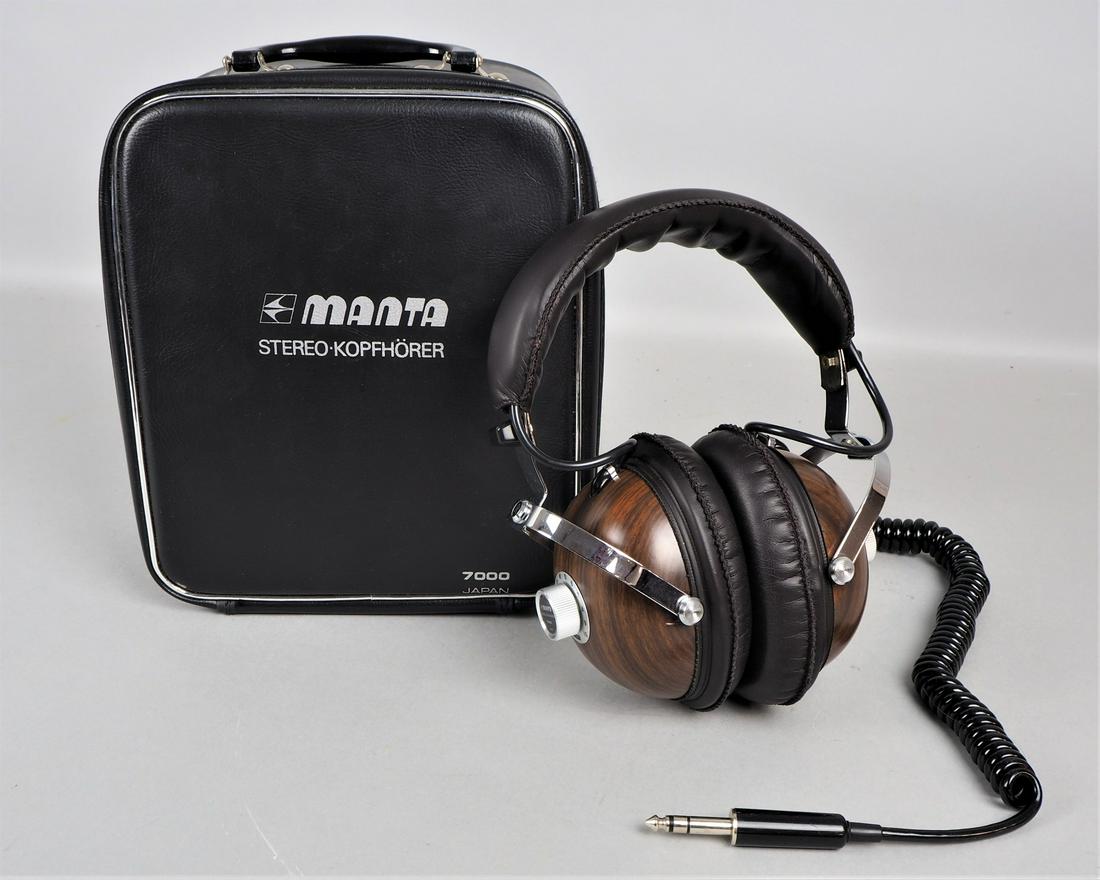 Manta stereo headphones, 1970s: Manta stereo headphones, 1970sRetro vintage headphones, model no. 7000, made in Japan, in the original case. Wooden look with solid sturdy metal frame and soft leather padding, there is a volume contr