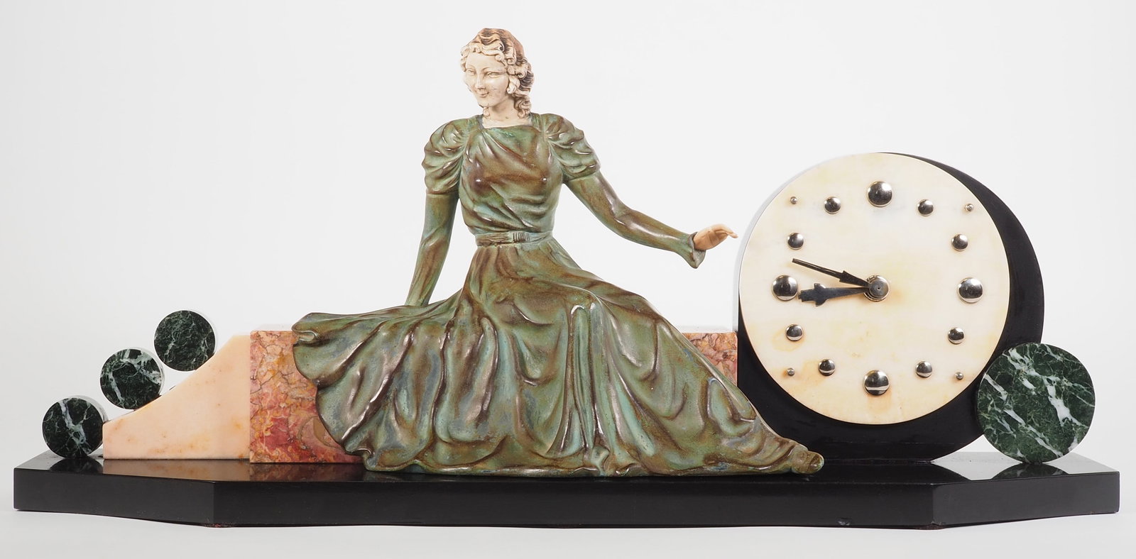 Large imposing Art Deco mantel clock, 1920s: Large imposing Art Deco mantel clock, 1920sClock case made of black granite and multi-colored marble. Long rectangular shape, with slightly chamfered corners at the front. Centered pedestal with a you