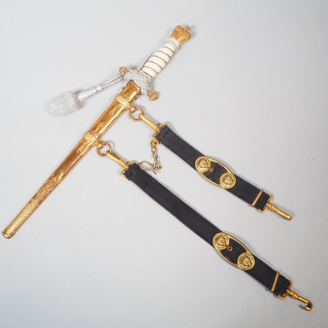 Kriegsmarine dagger for officers with hilt and portepee, maker WKC: Kriegsmarine dagger for officers with hilt and portepee, maker WKCDouble fullered blade on both sides, maker's stamp on ricasso ‘WKC’ with knight's head for Weyersberg, Kirschbaum & Cie, S