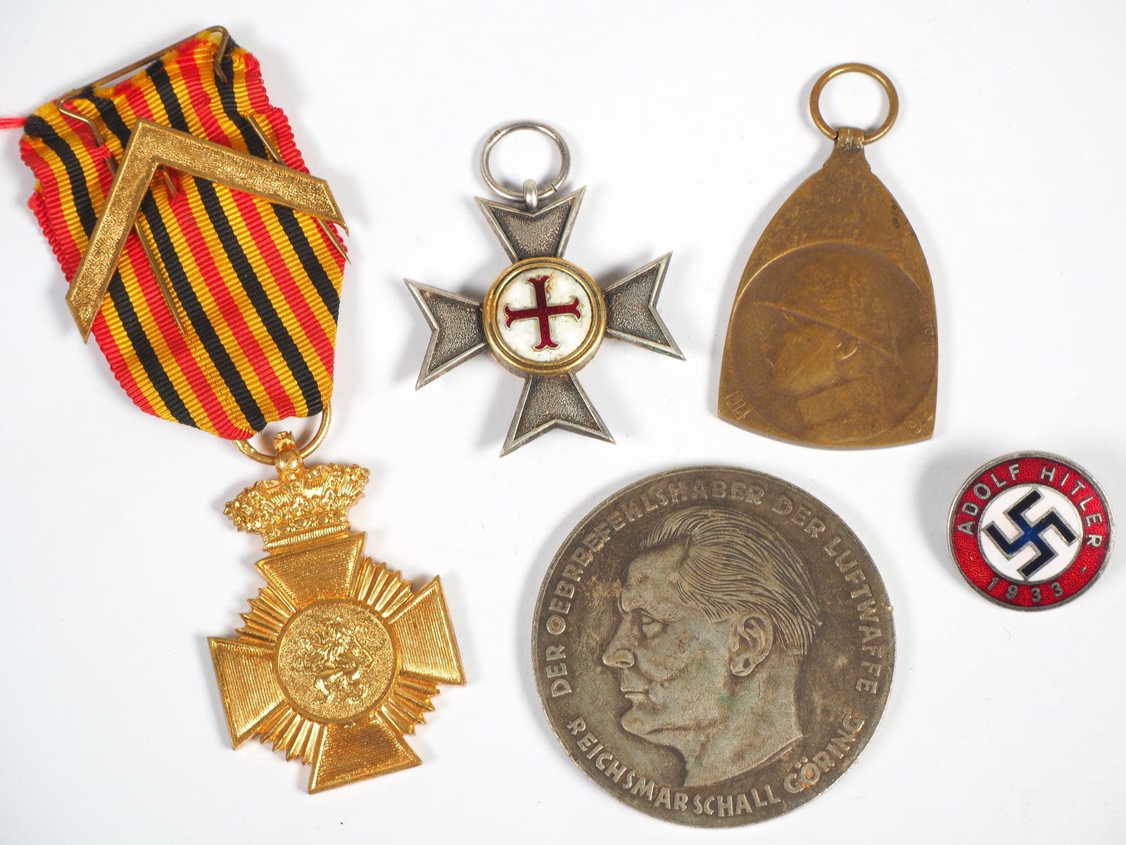 Collection of old medals badges WK1 WK2: Collection of old medals badges WK1 WK2Belgium War Remembrance Medal 1914 1918Luftwaffe WK2 Göring Medal Technical Service LuftwaffeParty badge early A.H.1933 RZM Ges.Gesch.Cross of Merit " Dem V