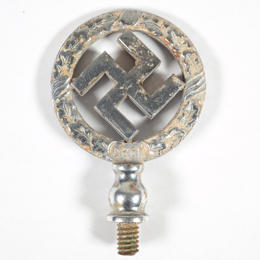 NSDAP Party Officials Fender Flag Topper, 1930s: NSDAP Party Officials Fender Flag Topper, 1930s Rare flag spike for an NSDAP car bumper, usually attached to the fender. Non-magnetic metal, nickel-plated, with thread for screwing on. Swastika in oak