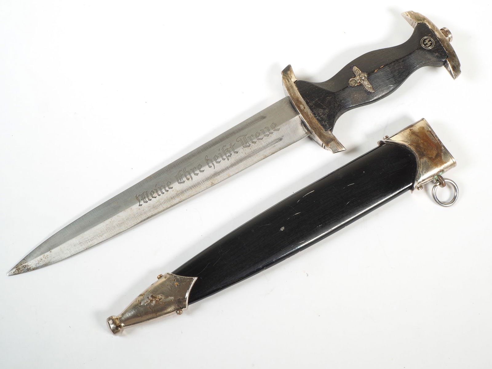 SS Service Dagger RZM 1053/38 Third Reich: SS Service Dagger RZM 1053/38 Third Reich SS Service Dagger with blade RZM 1053/38 SS Old, unverified piece, beautiful blade. Blade logo “Meine Ehre heisst Treue” (My honor is loyalty), Signs