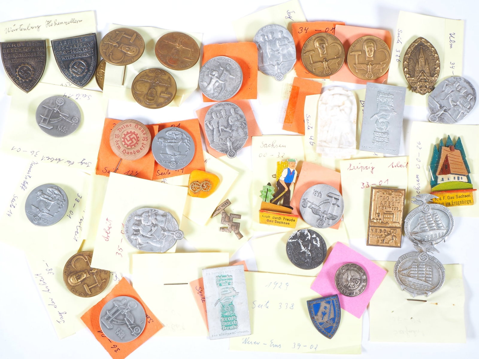 WHW badge collection, meeting badges, many Labour Day tinnies, 39 pieces, 3rd Reich: WHW badge collection, meeting badges, many Labour Day tinnies, 39 pieces, 3rd Reich From the estate of a collector of Winterhilfswerk (WHW) badges and donation receipts. The collection contains pins, 