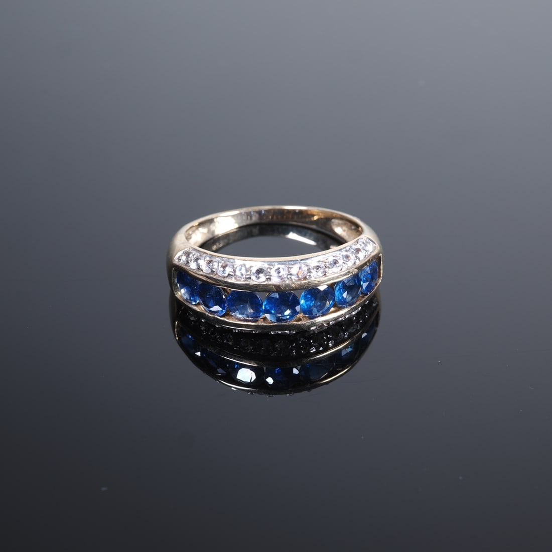 Burmese Sapphire Gold Ring: Burmese Sapphire Gold Ring9ct yellow gold, 375/000 fineness, ring head set with 7 Burmese round-cut sapphires from Myanmar approx. 1.244ct. and 26 white brilliant-cut sapphires from Madagascar