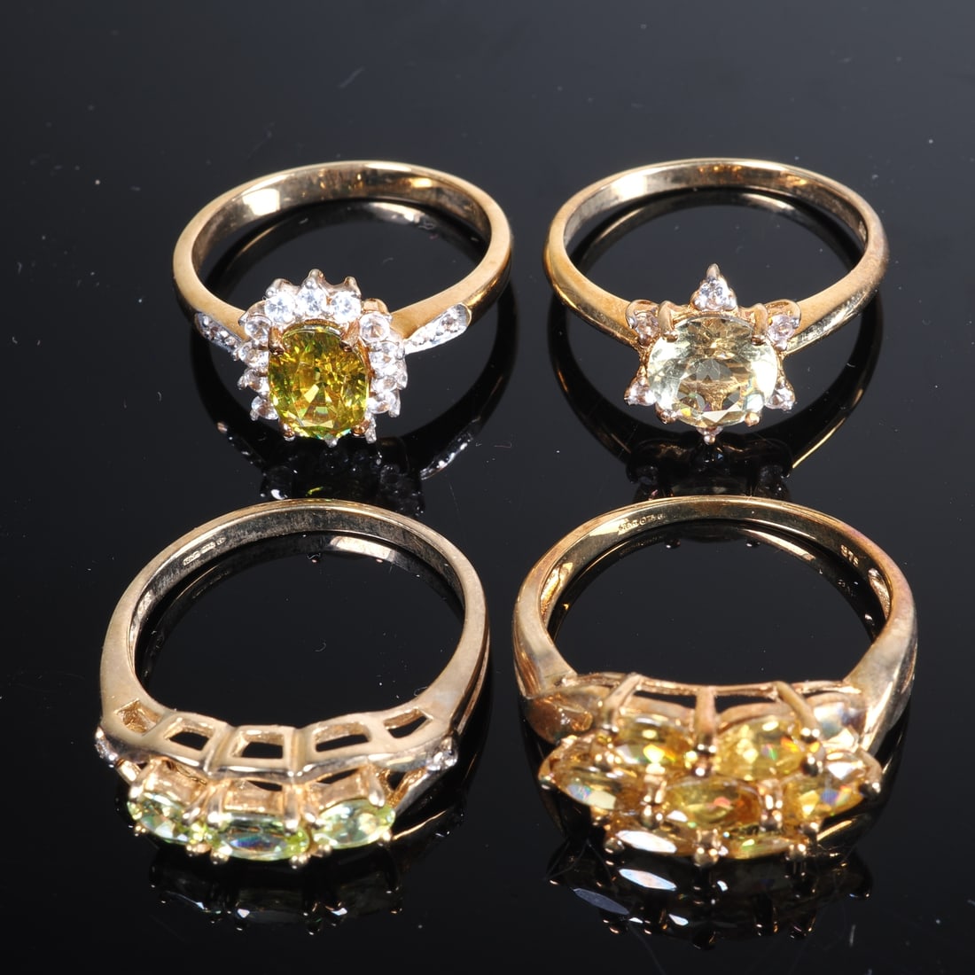 4 ladies’ rings with gemstones, 9 carat yellow gold: 4 ladies’ rings with gemstones, 9 carat yellow goldAll 375/000 yellow gold with Juwelo certificates. 1.) Sphen gold ring 2.) Capelinha-Sphen gold ring with zircons 3.) Capelinha Sphen gold ring