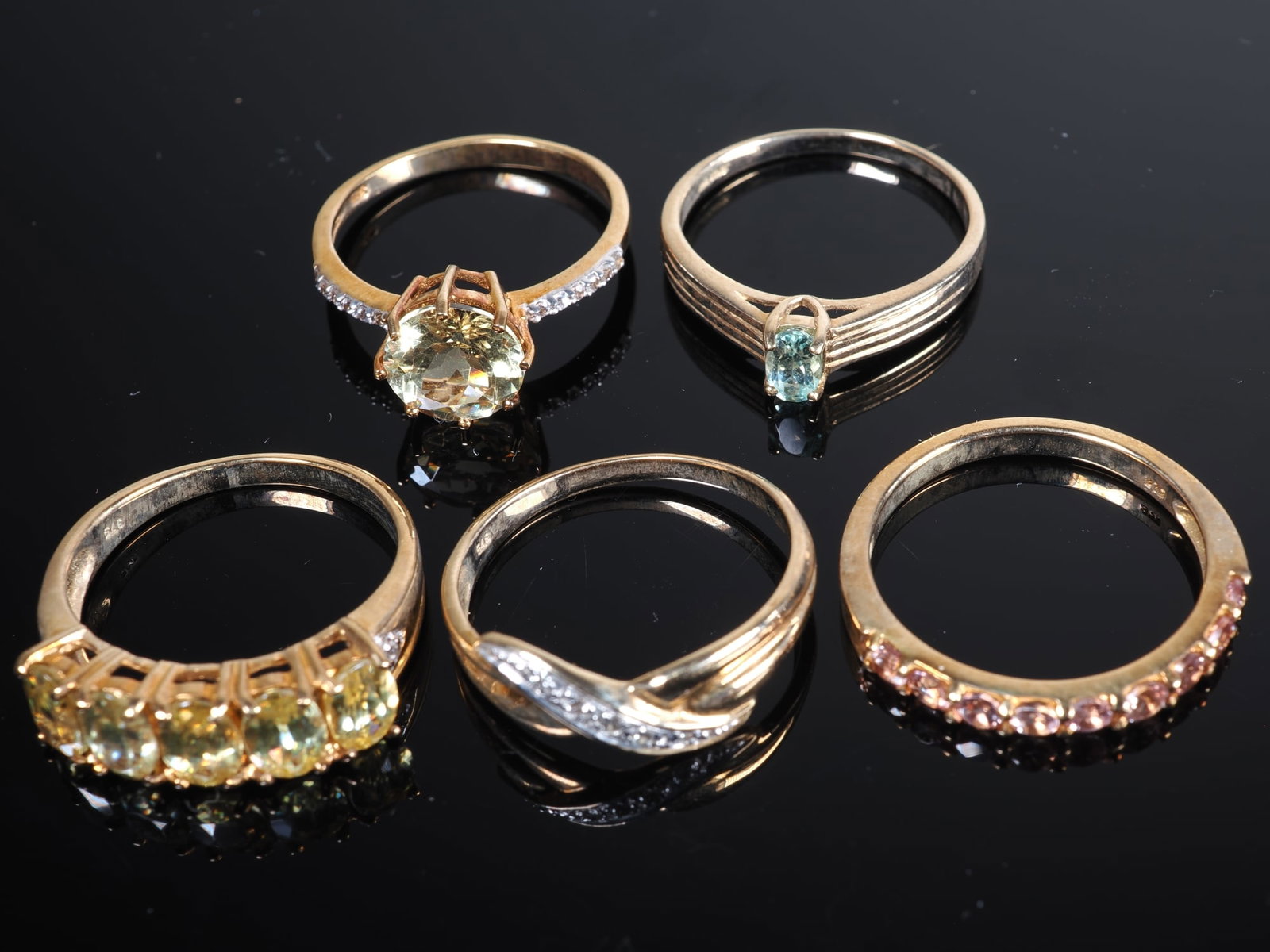 5 ladies’ rings set with gemstones, 9-carat yellow gold: 5 ladies’ rings set with gemstones, 9-carat yellow goldAll 375/000 yellow gold with Juwelo certificates. 1.) AAA Imperial Topaz gold ring 2.) IF diamond (D) gold ring 3.) Brazilian Paraiba