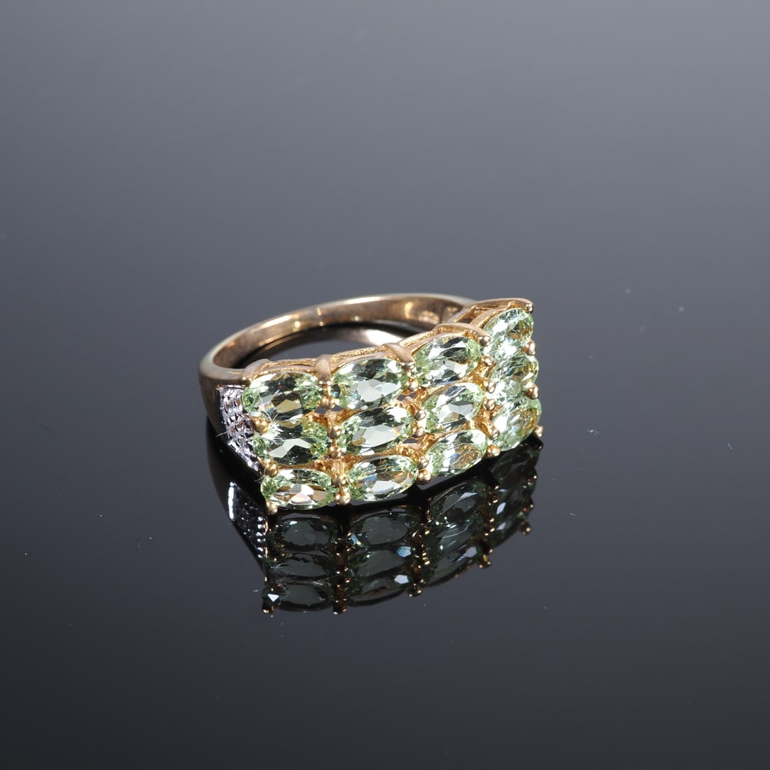 Merelani Mint Garnet Gold Ring: Merelani Mint Garnet Gold Ring9ct yellow gold, 375/000 fineness, ring head set with 12 oval-cut green garnets, approx. 2.63ct, ring shanks set with 10 zircons, virtually new and unworn, inner