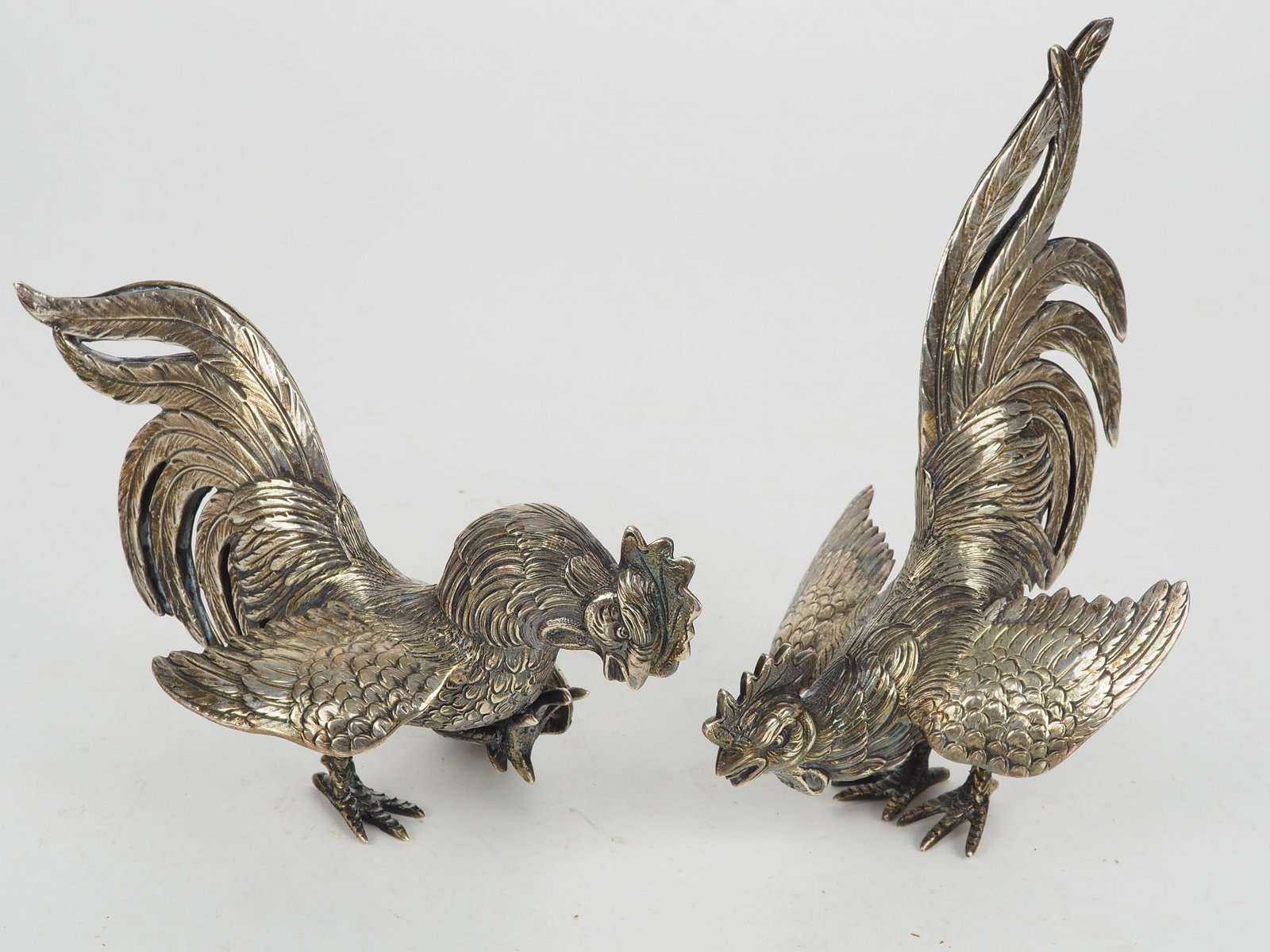 Pair of silver fighting cocks, probably 1930s (1 of 2)