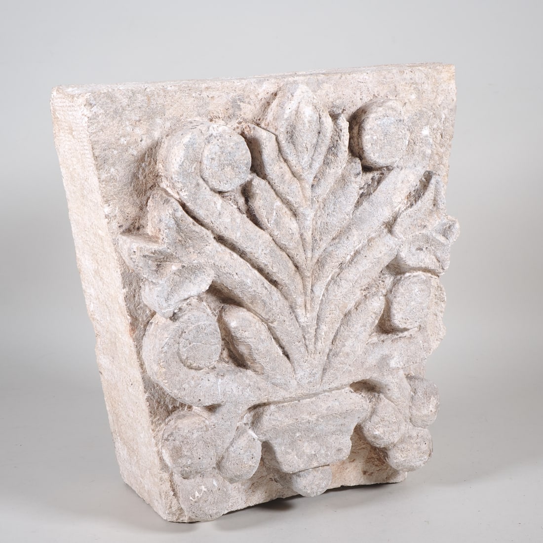 Roman palmette, architectural stone relief: Roman palmette, architectural stone reliefOriginal Roman palmette, approx. 2000 years old. Stone relief carved in the shape of a fan palm leaf. Dimensions: 36 x 34 x 16 cm. Weight: 27 kg. Provenance: