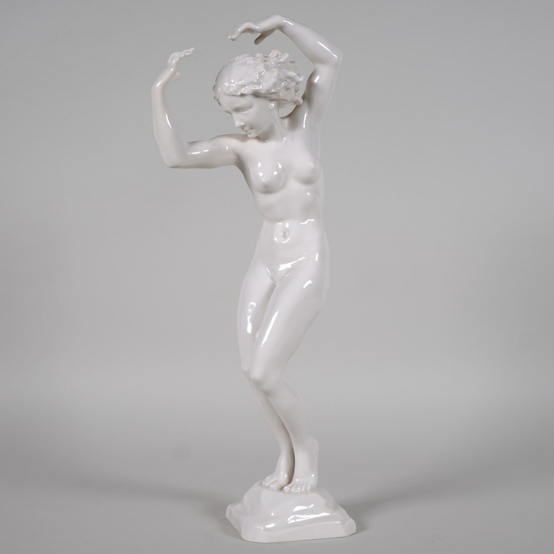 Karl Tutter - Standing Female Nude, circa 1938: Karl Tutter - Standing Female Nude, circa 1938Rare Art Deco porcelain figurine by Hutschenreuther Selb Art Department, designed by Karl Tutter, depicting a young naked woman in a dancing pose with sli