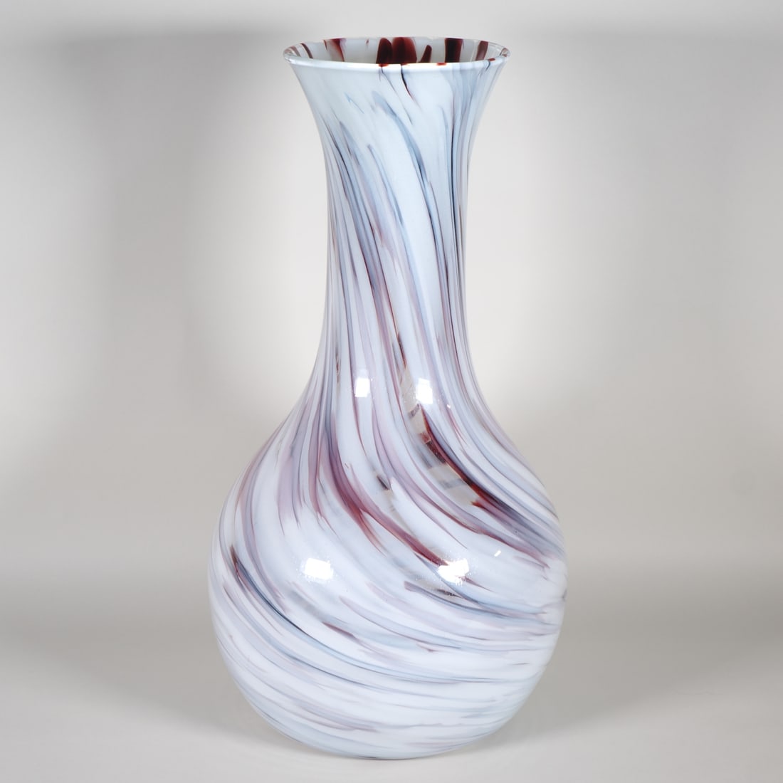 Large Murano glass vase, height 62 cm. Mid-20th century.: Large Murano glass vase, height 62 cm. Mid-20th century. Hand-blown glass vase with melted colour threads (latticino), bulbous body with long, slender neck and slightly flared rim. Monumental size of