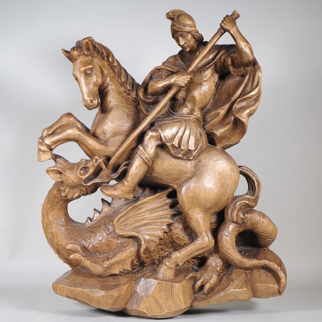 Large wall relief of Saint George slaying the dragon (1 of 4)